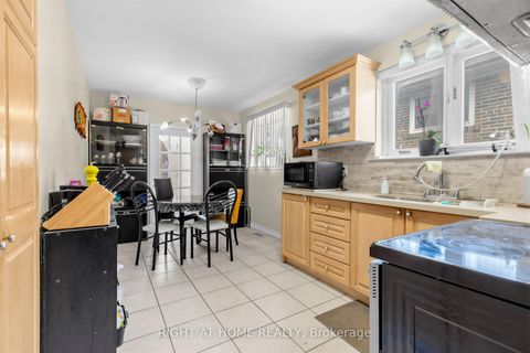 Photo 7 at 5 Thwaite Avenue, Jane Heights, Toronto