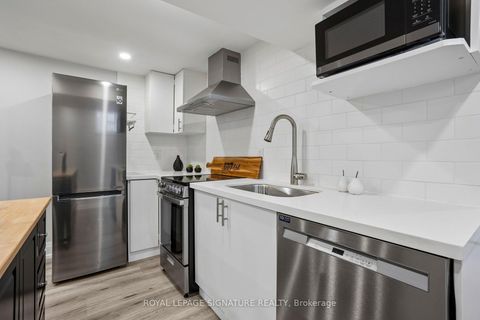 Photo 34 at 972 Cosburn Avenue, Lumsden, Toronto
