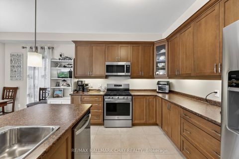 Photo 7 at 12 Orleans Avenue, Shore, Barrie