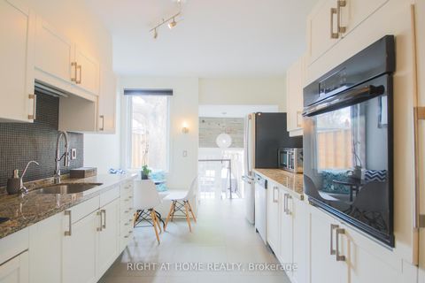 Photo 7 at 44 Rhodes Avenue, Coxwell, Toronto