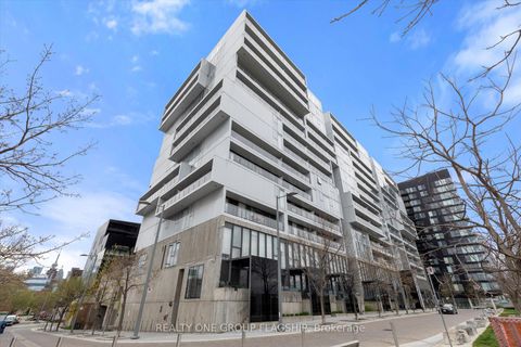 Photo 1 at 409 - 32 Trolley Crescent, Moss Park, Toronto