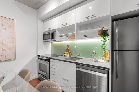 Photo 3 at 409 - 32 Trolley Crescent, Moss Park, Toronto