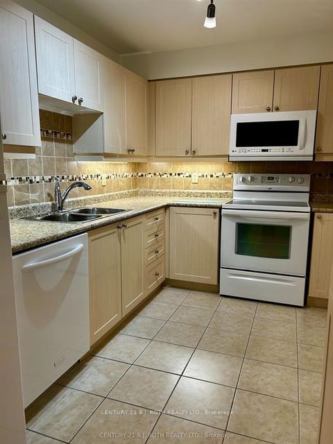 Photo 7 at 203 - 500 Mapleview Drive W, Holly, Barrie