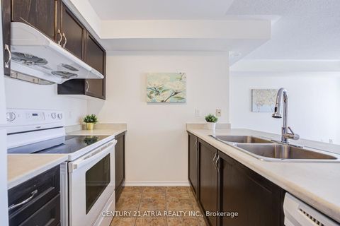 Photo 5 at 5 - 129 Isaac Devins Boulevard, Pelmo Park W5, Toronto