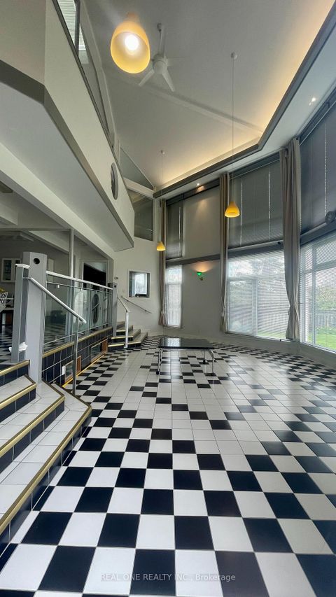 Photo 1 at 71 Stock Avenue, City Centre West, Toronto