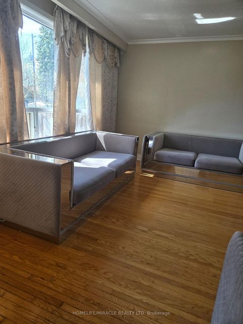 Photo 2 at 25 Chandler Drive, Woburn, Toronto