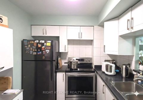 Photo 12 at 1229 - 68 Corporate Drive, Woburn, Toronto