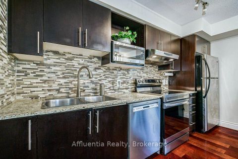 Photo 8 at 408 - 120 Dallimore Circle, Don Mills, Toronto