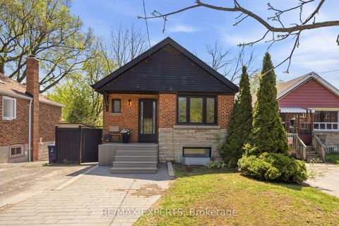 Photo 0 at 221 Clonmore Drive, Cliffside, Toronto
