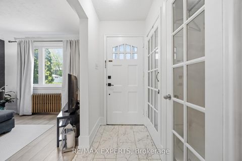 Photo 1 at 221 Clonmore Drive, Cliffside, Toronto