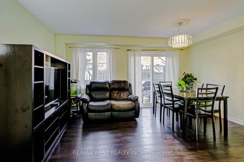 Photo 1 at 12 - 6400 Lawrence Avenue E, Rouge E10, Toronto