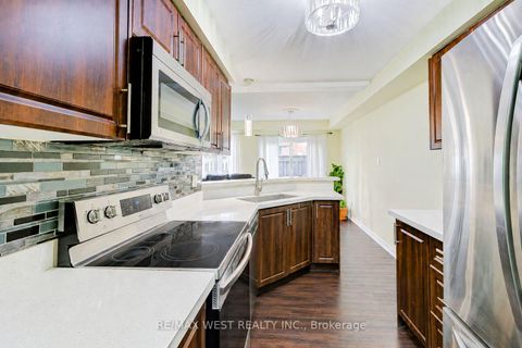 Photo 5 at 12 - 6400 Lawrence Avenue E, Rouge E10, Toronto