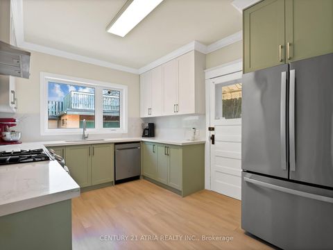 Photo 0 at 32 Rosevear Avenue, Crescent Town, Toronto