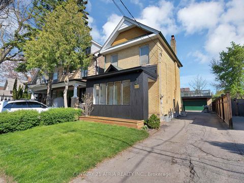 Photo 1 at 32 Rosevear Avenue, Crescent Town, Toronto