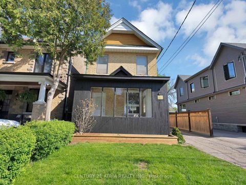 Photo 2 at 32 Rosevear Avenue, Crescent Town, Toronto