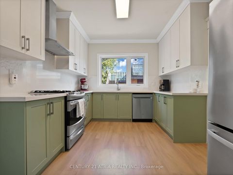 Photo 5 at 32 Rosevear Avenue, Crescent Town, Toronto