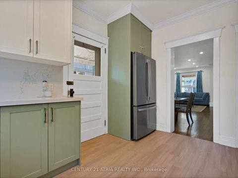 Photo 6 at 32 Rosevear Avenue, Crescent Town, Toronto