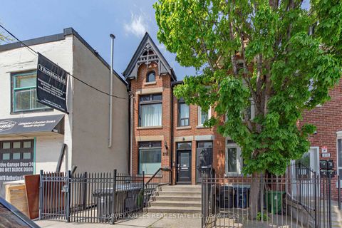 Photo 1 at 210 Gerrard Street E, Moss Park, Toronto