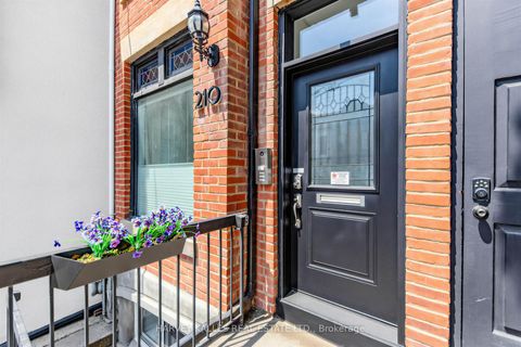 Photo 2 at 210 Gerrard Street E, Moss Park, Toronto