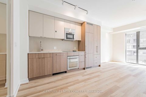 Photo 1 at 409 - 840 St Clair Avenue W, Oakwood Village, Toronto