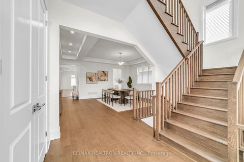 Photo 9 at 8 Saxby Farm Avenue, King City, King