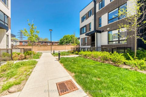 Photo 2 at 14 - 30 Ed Clark Gardens Boulevard, Pellam Park, Toronto