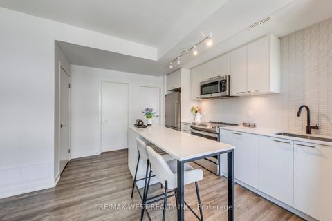 Photo 16 at 14 - 30 Ed Clark Gardens Boulevard, Pellam Park, Toronto