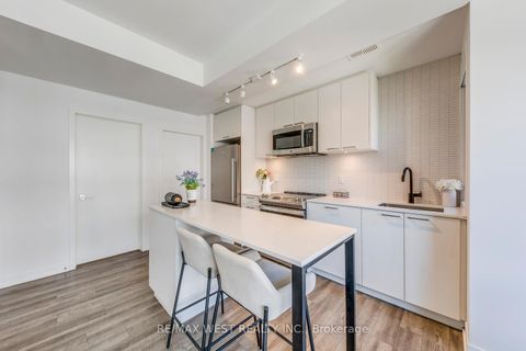Photo 17 at 14 - 30 Ed Clark Gardens Boulevard, Pellam Park, Toronto