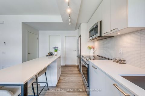 Photo 19 at 14 - 30 Ed Clark Gardens Boulevard, Pellam Park, Toronto