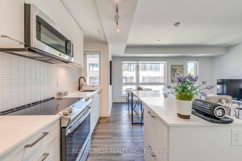 Photo 21 at 14 - 30 Ed Clark Gardens Boulevard, Pellam Park, Toronto