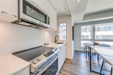 Photo 22 at 14 - 30 Ed Clark Gardens Boulevard, Pellam Park, Toronto