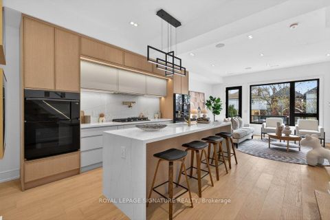 Photo 8 at 53 Lesmount Avenue, East York, Toronto