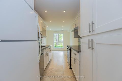 Photo 15 at 50 - 27 Proudbank Millway, Windfields, Toronto