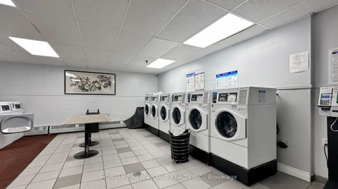 Photo 30 at 303 - 1950 Kennedy Road, Dorset Park, Toronto