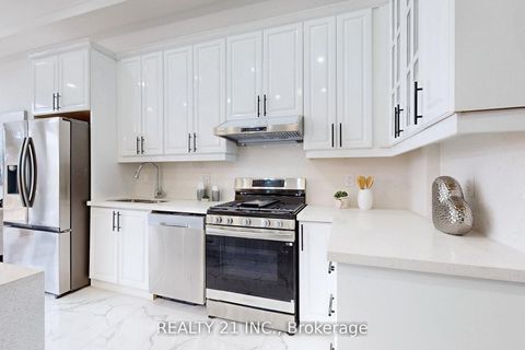 Photo 8 at 15 Malta Street, Cliffside, Toronto
