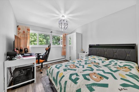 Photo 11 at 48 - 85 Driftwood Avenue, Jane Heights, Toronto