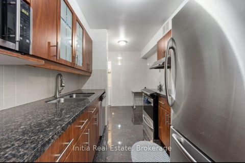 Photo 4 at 406 - 25 Silver Springs Boulevard, L'Amoreaux, Toronto