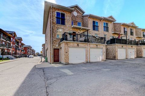 Photo 2 at 48 Strangford Lane, Birchmount, Toronto