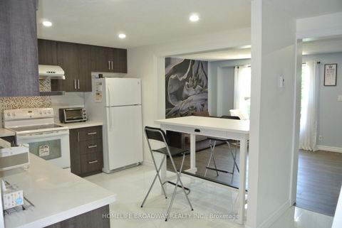 Photo 3 at 54 - 850 Huntingwood Drive, L'Amoreaux, Toronto