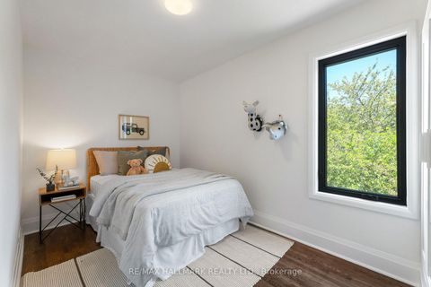 Photo 23 at 203 Parkmount Road, Coxwell, Toronto