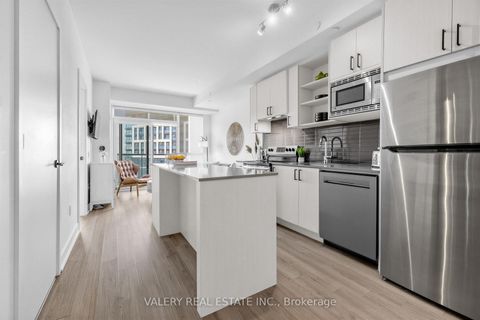 Photo 1 at 411 - 60 George Butchart Drive, CFB, Toronto