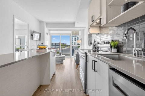 Photo 2 at 411 - 60 George Butchart Drive, CFB, Toronto