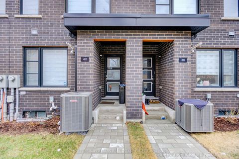 Photo 3 at 40 Akil Thomas Gardens, Bendale, Toronto