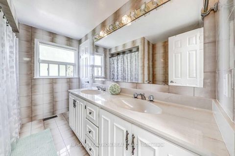 Photo 11 at 117 Dunsfold Drive, Malvern, Toronto