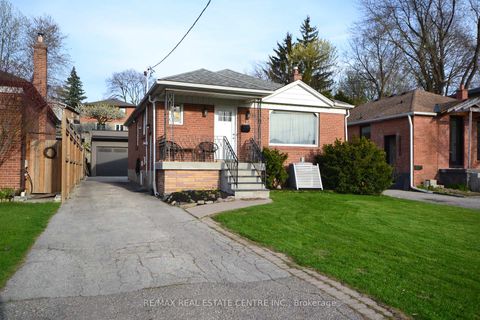 Photo 1 at 75 Cynthia Road, Smythe, Toronto