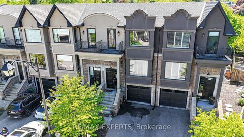 Photo 2 at 22 Matthew Court, Rosethorn, Toronto