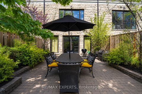 Photo 33 at 22 Matthew Court, Rosethorn, Toronto