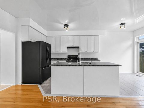Photo 4 at 38 Enroutes Street, Danforth, Toronto