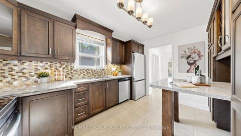 Photo 13 at 63 Flora Drive, Dorset Park, Toronto