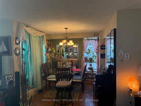 Photo 1 at 103 - 1705 Mccowan Road, Malvern West, Toronto